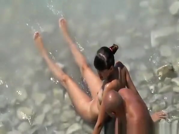 Bald nudist man fucks wife next to water