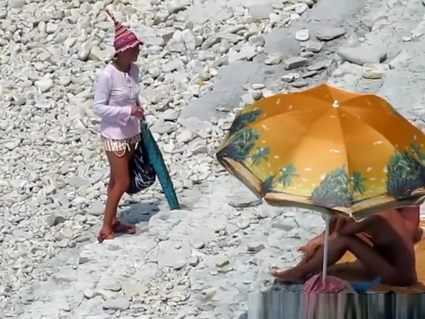 Nudist woman blows cock in beach
