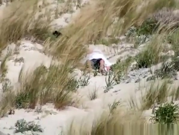 Couple caught fucking in the beach dunes