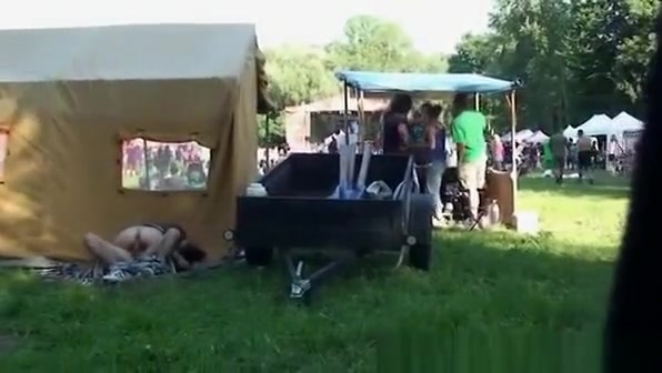 Drunk girl having sex with a boy under a tent