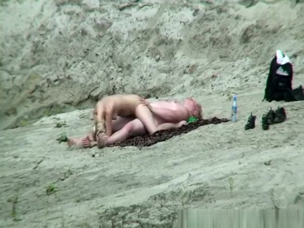 Nude couple fucking in the rocks