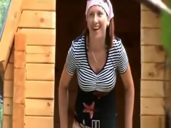 Lady pees in wooden cabin