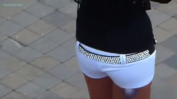 Pretty girl in white, sexy shorts