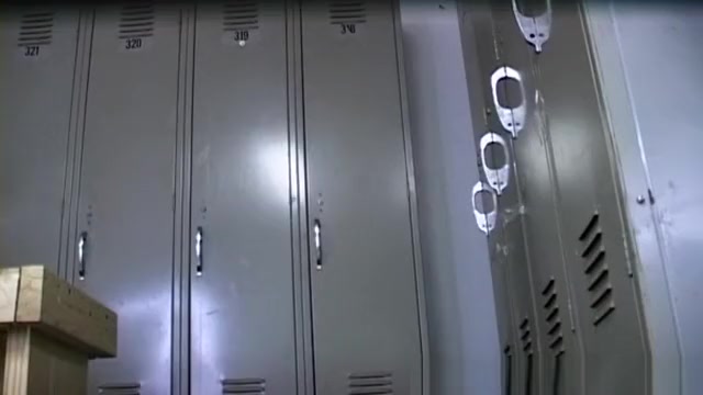 Hot blonde changing in locker room