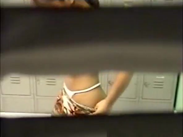 Large Breasted Woman Gets Nude in the Lockerroom