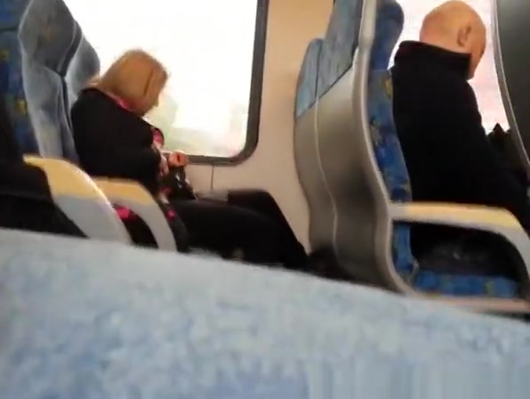 Guy plays with his cock next to female passenger