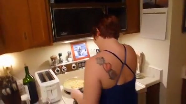 Big booty wife cooking in thong