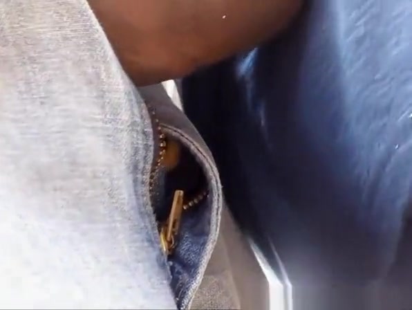 Exhibitionist man has his cock outside his pants