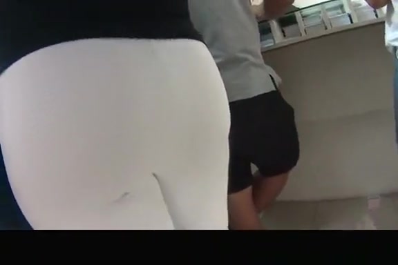 Dude touches ebony woman's ass