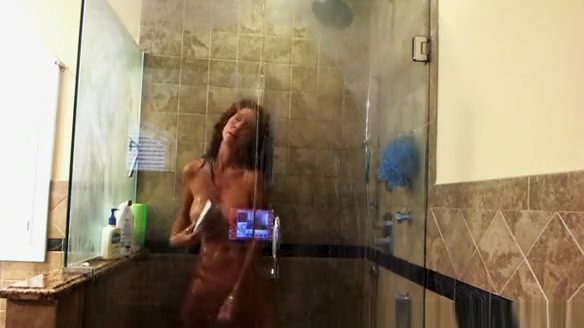 Busty milf masturbating in the shower
