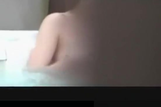 Japanese couple in hotel Jacuzzi