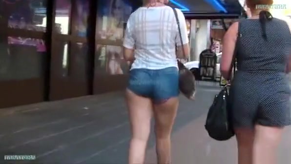 Girl with a bigger ass in tight shorts