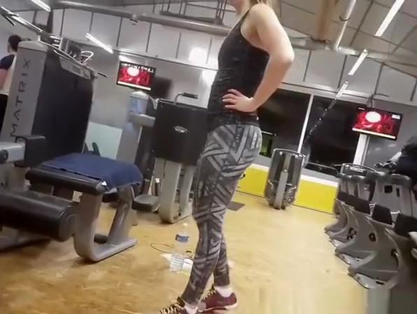 Woman in yoga pants exercising