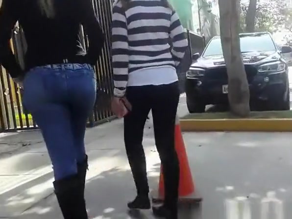 Teens walking in the street have nice asses