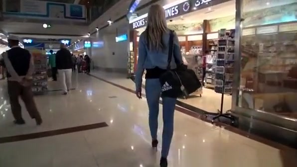 Nice ass blonde in tight jeans pants