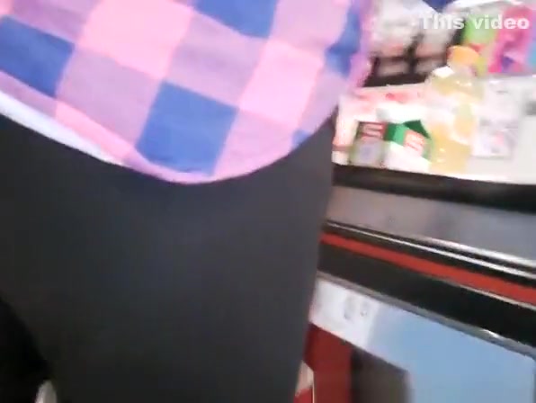 Girl with nice ass at the supermarket checkout