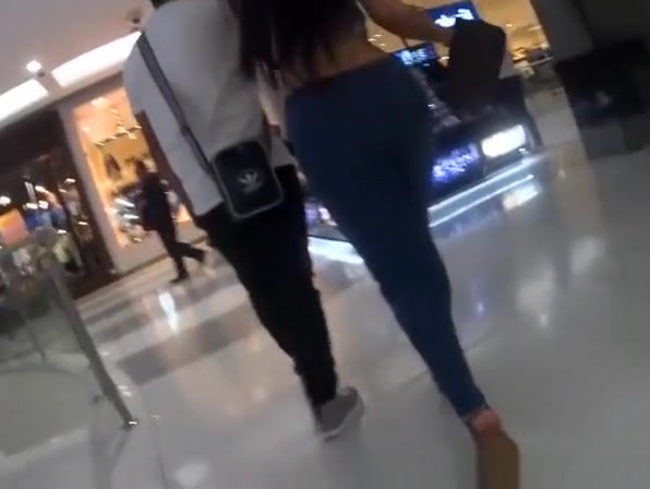 Long hair brunette with big booty in tight pants