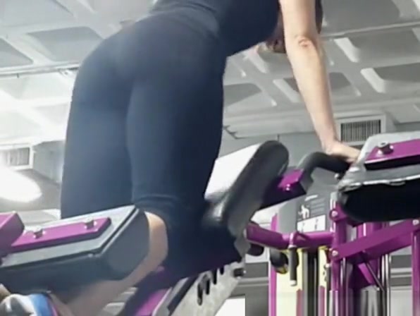 Fit brunette girl spied in the gym exercising