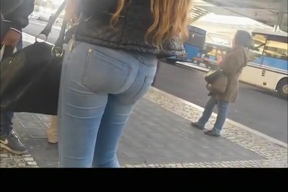 Long hair teen in tight jeans pants