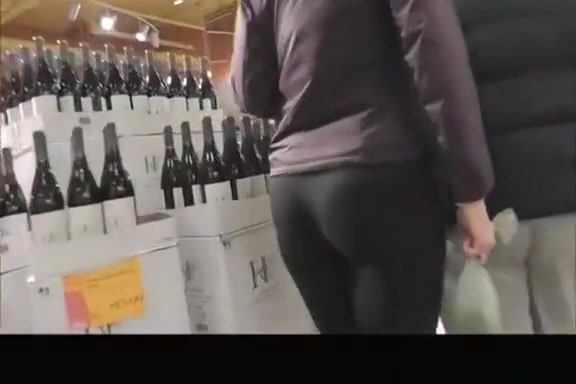 Woman with nice ass in black leggings