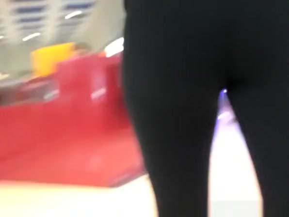 Nerd teen in black leggings walking
