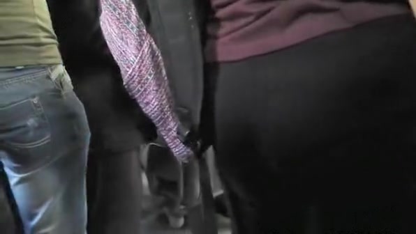 Nice ass woman in tight dark pants