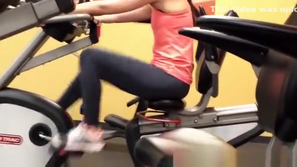 Woman exercising legs in gym