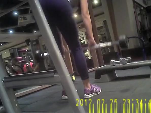 Woman in dark sports pants exercising