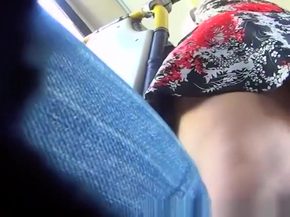 Woman upskirted in the bus by voyeur passenger