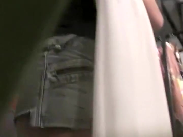 Tight ass and panties under her skirt