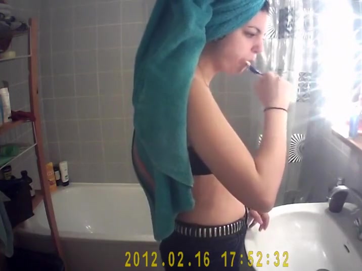 Hot girl's tits spied while washing teeth
