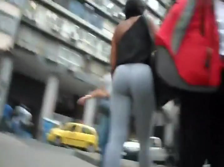 Muscular ass in light grey tights