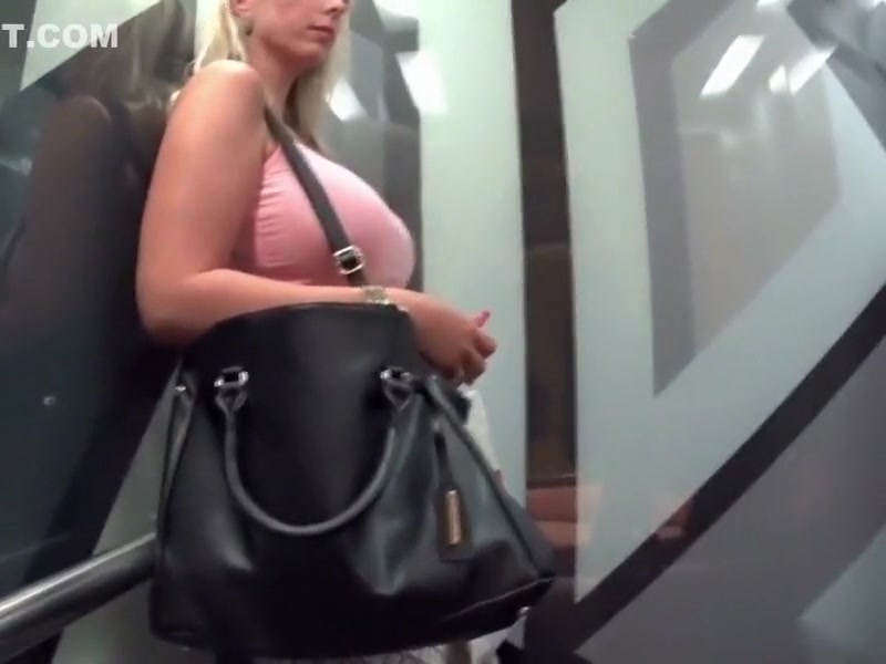 In elevator with busty woman