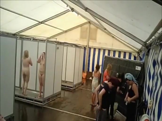 Lots of naked girls in a big public shower