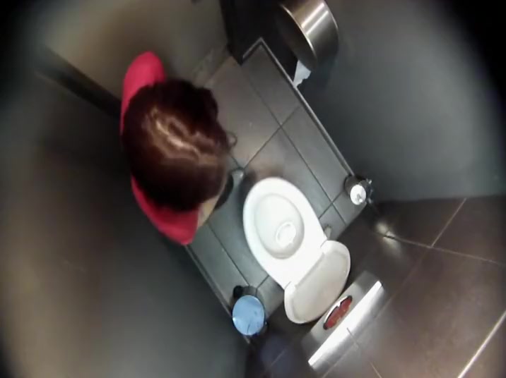 Filming her from a toilet ceiling
