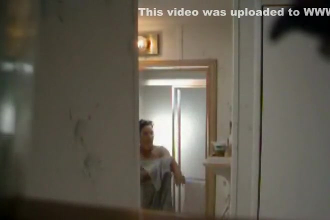 Peeped mother steps out of a shower