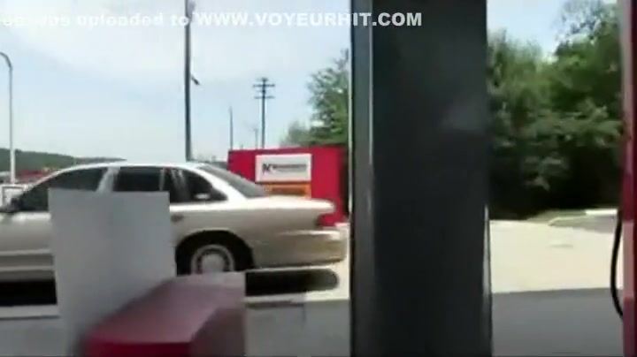 Hot chick flashes ass on a gas station