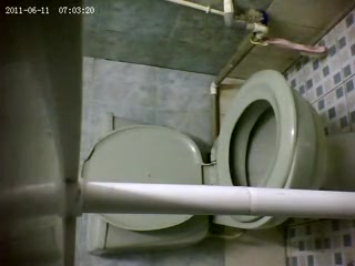 Sporty girl pissing in an old wc