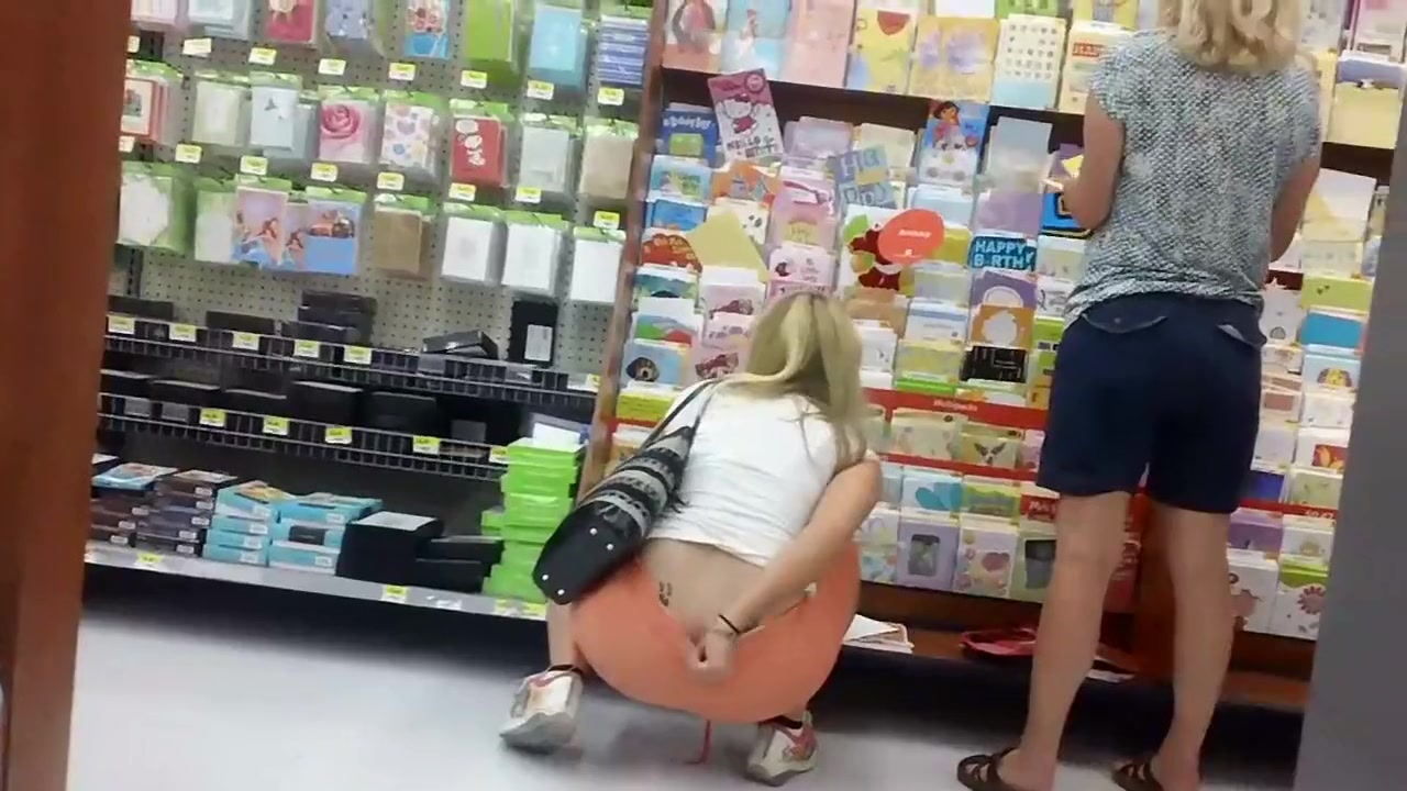 Sexy teen girl shopping with mom