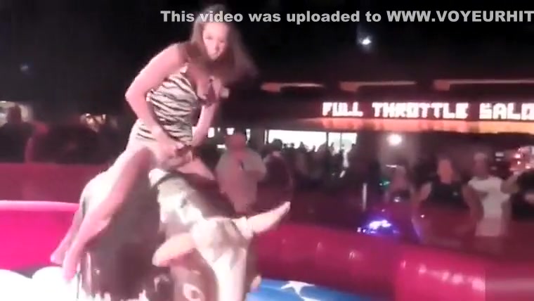 Fabulous babe has her crotch revealed while riding the bull