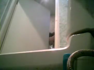 Skinny beauty in a skirt pees in spycam video