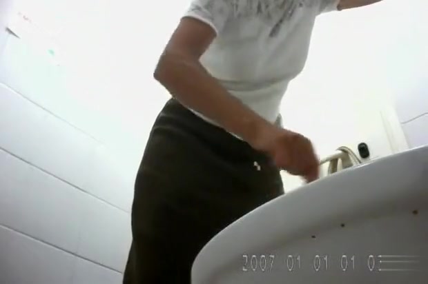 Brunette goes poop in a hidden camera video