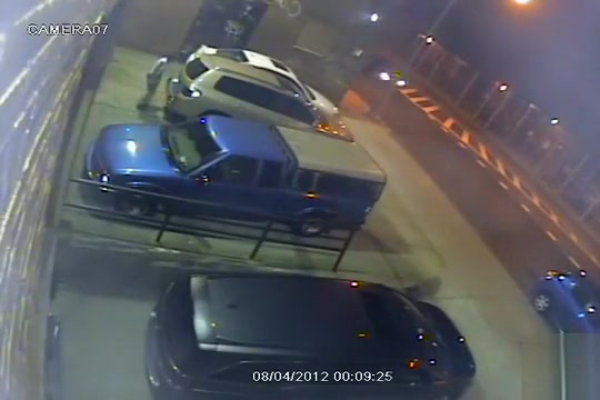 Security camera catches a girl peeing behind a car