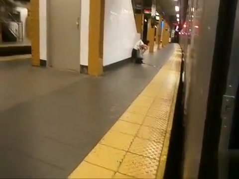 Drunk coed relieves herself at a metro station