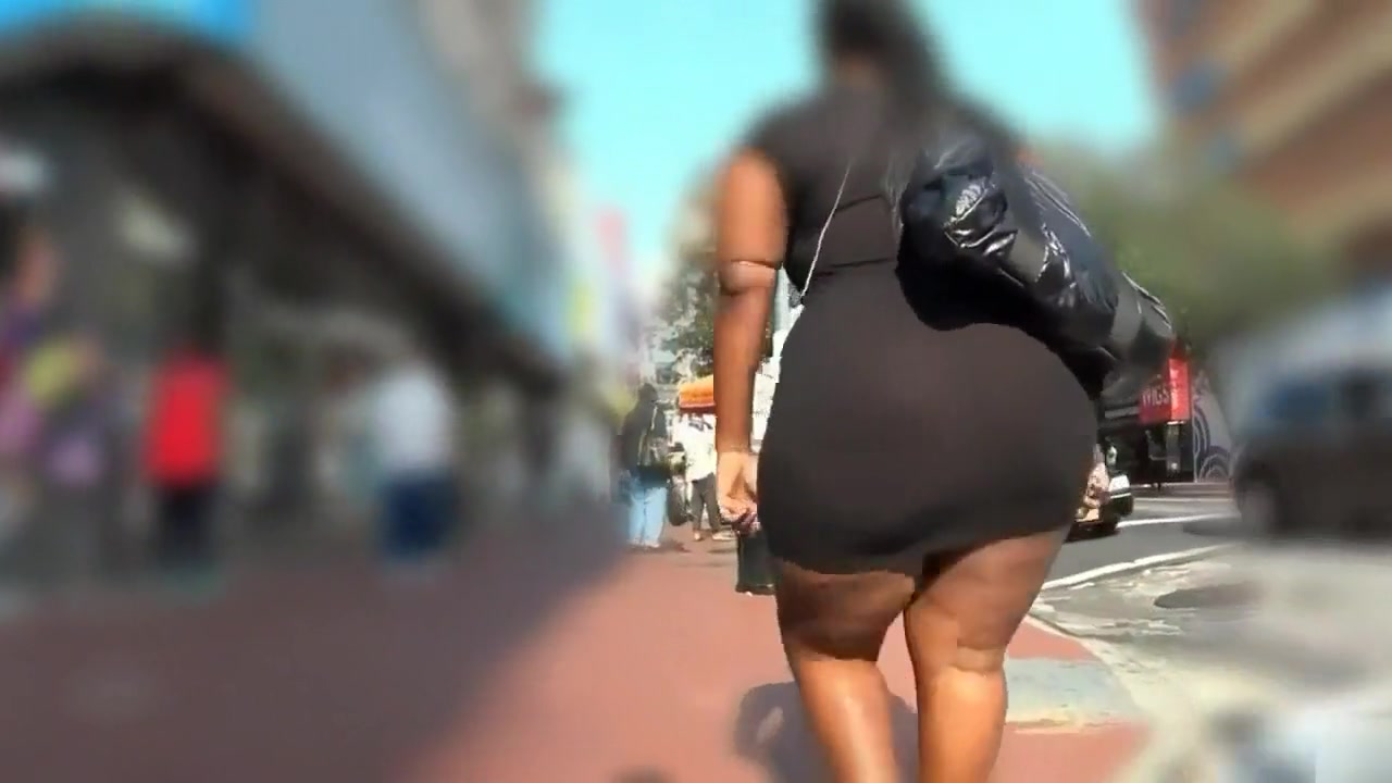 Ebony BBW with a huge booty walks down the street