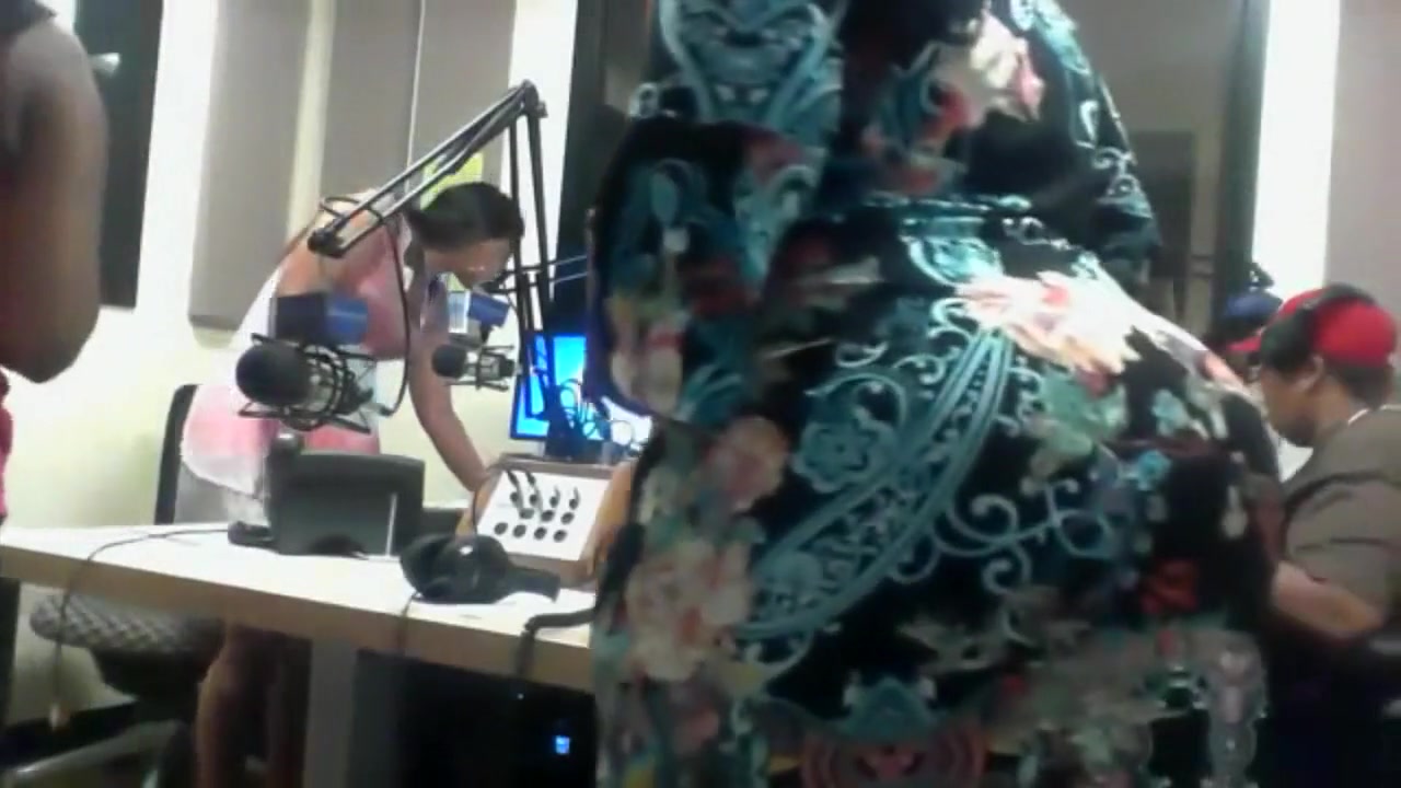 Our bootylicious producer in a dress has her huge ass bitten on by a colleague