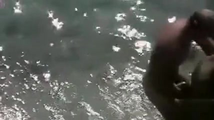 Voyeur doggystyle sex with couple in the ocean