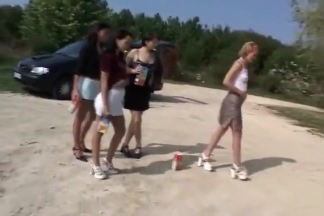 Naughty girlfriends compete to see who can piss the farthest distance