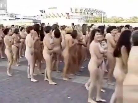 Hundreds of people strip nude to pose for a picture