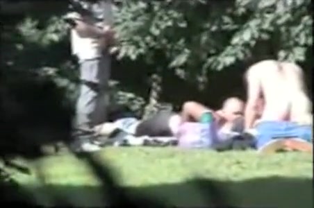 Group of old daddies fool around with woman in the grass